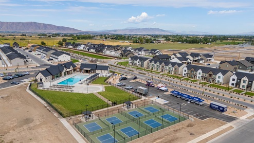 Viridian clubhouse exterior in Salem Utah featuring pickleball courts and pool