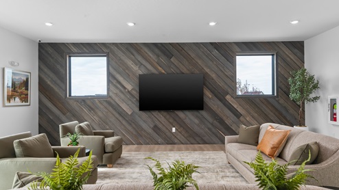 Main clubhouse space with living room and kitchen for hosting.