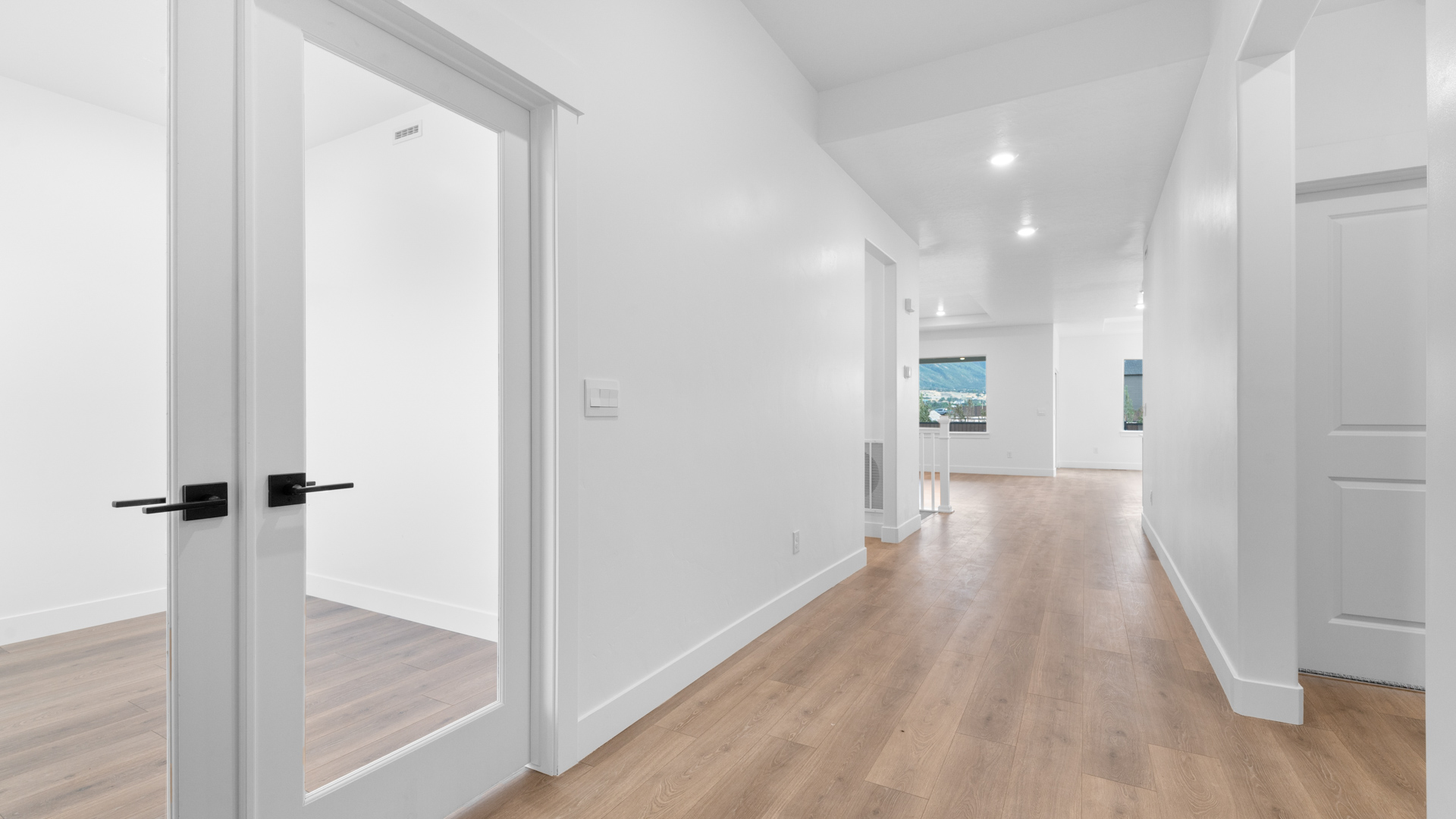 Entry into home and glass doors into office space.