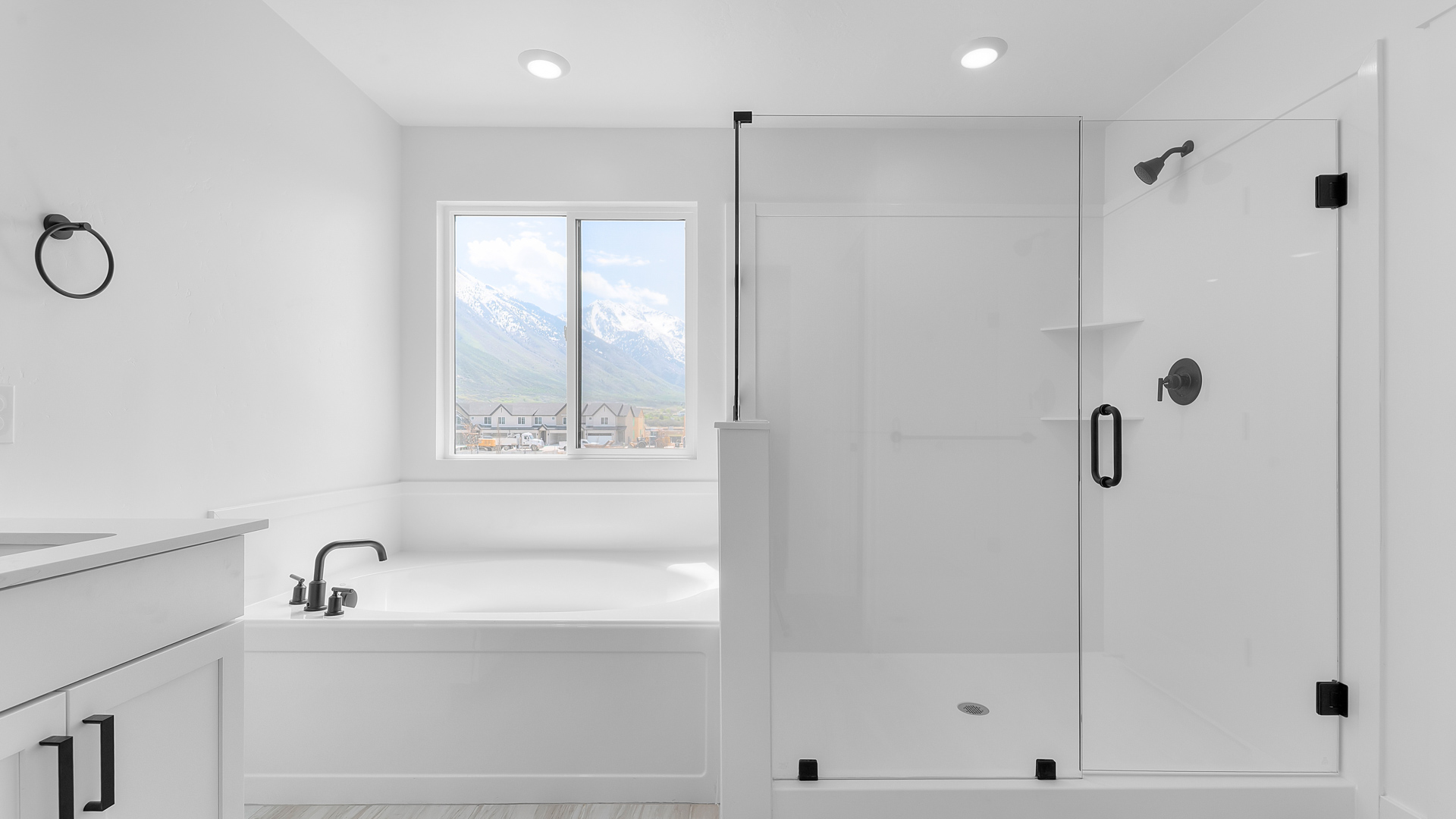 Primary bathroom with walk-in shower and tub