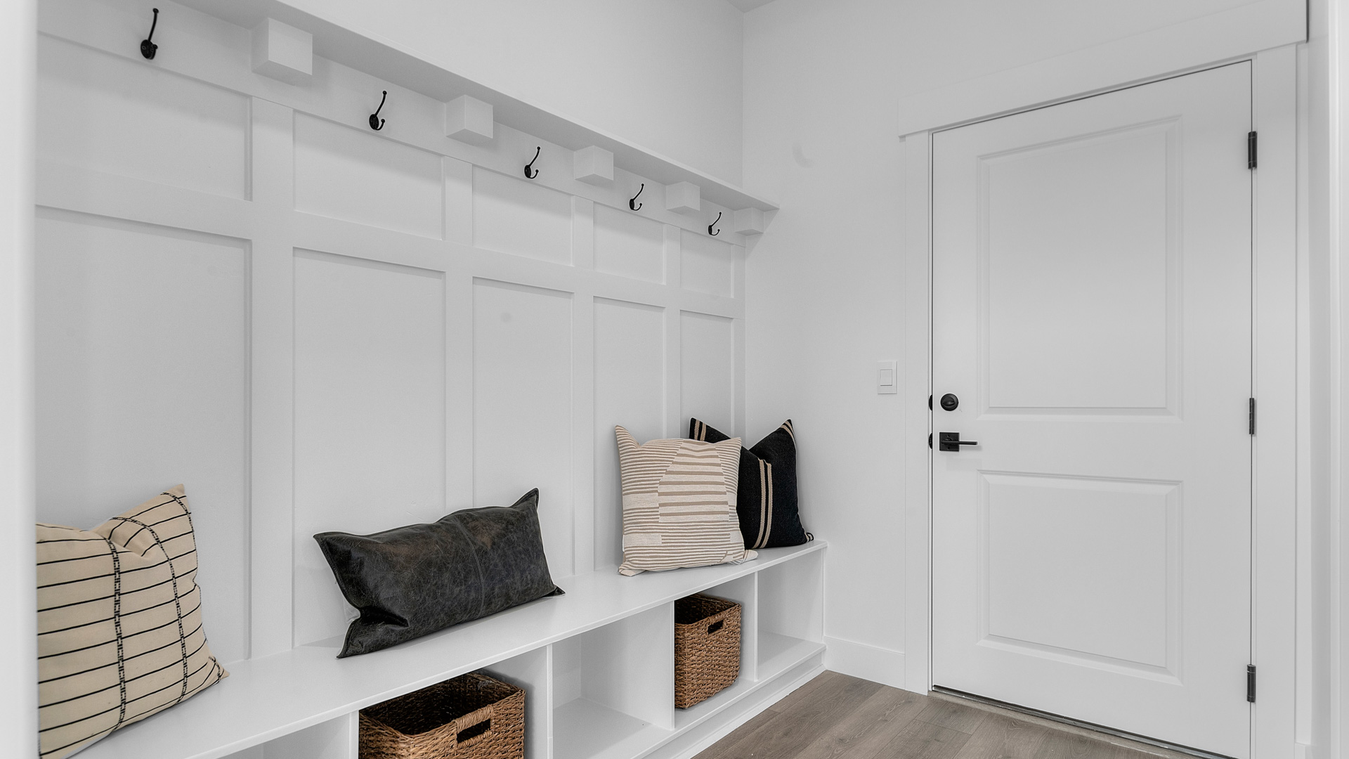 Mudroom with mudroom bench and shelving.