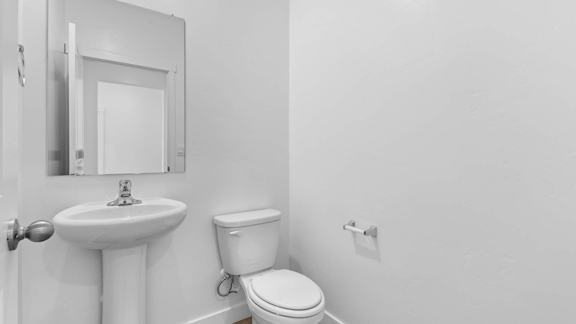 Powder bath with pedestal sink.