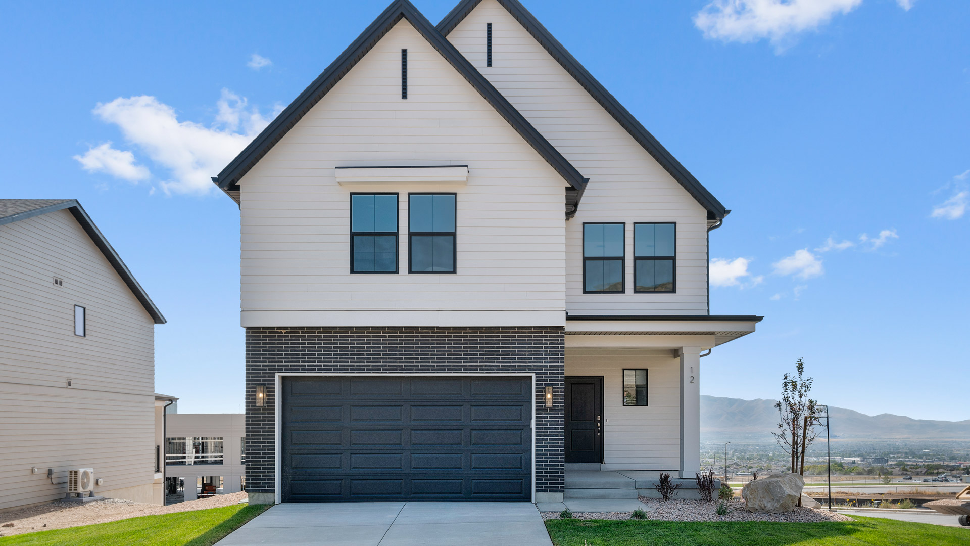 Scandinavian farmhouse exterior of Clover in Lehi Utah.