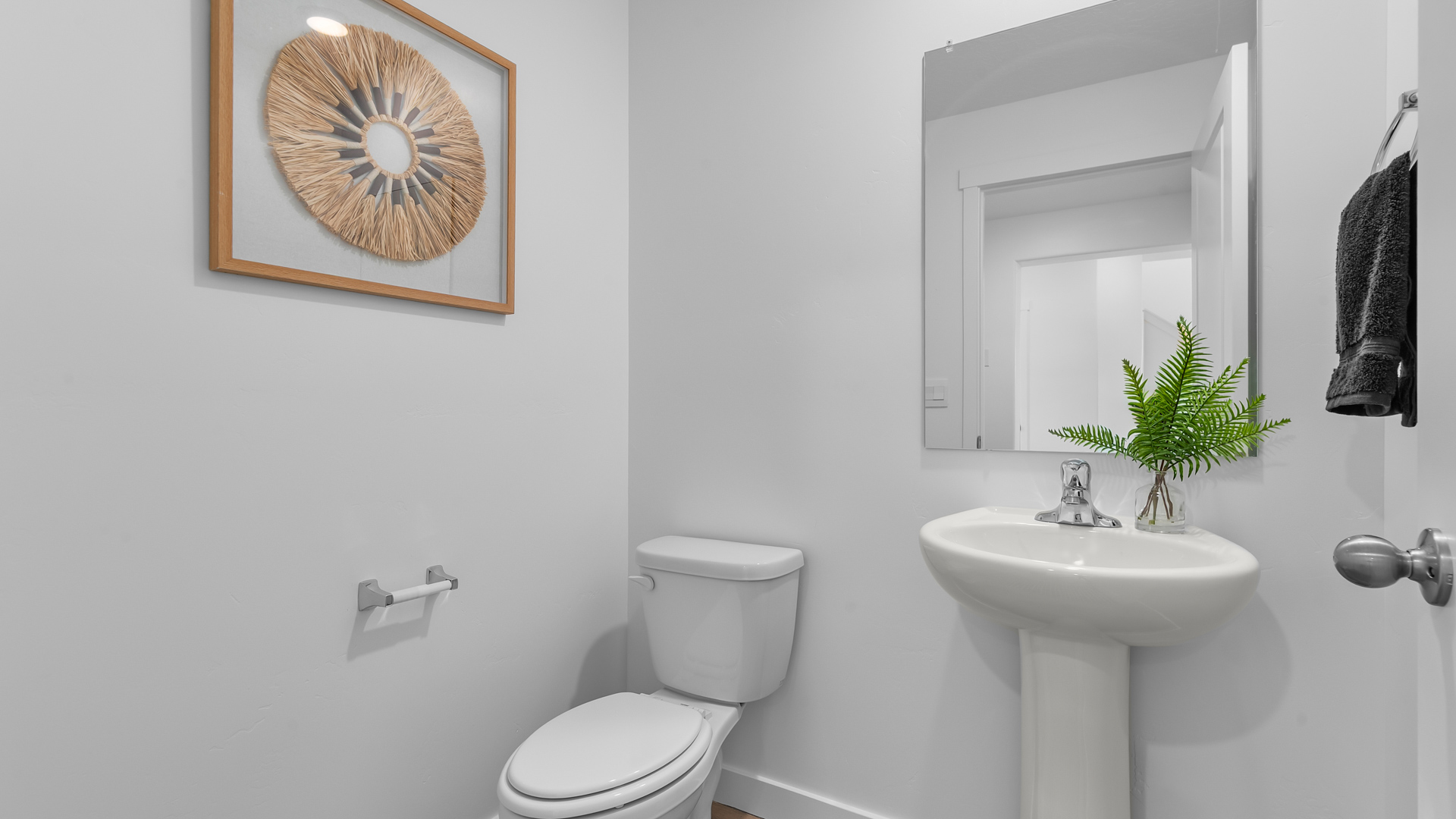 Powder bath with pedestal sink.