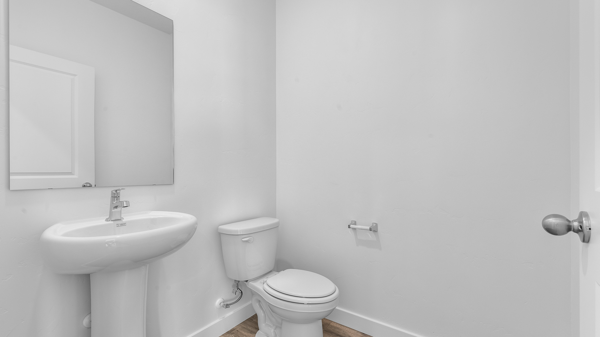 Powder bath with pedestal sink.