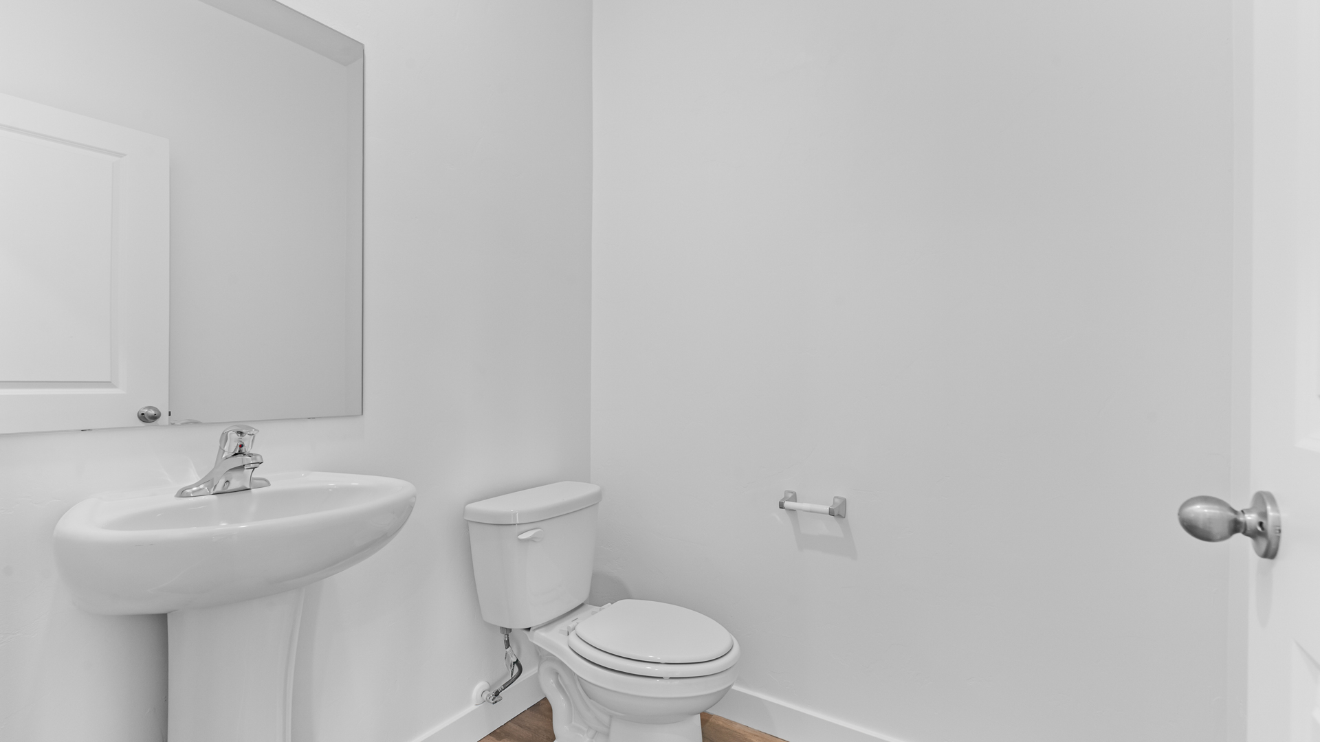 Powder bath with pedestal sink.