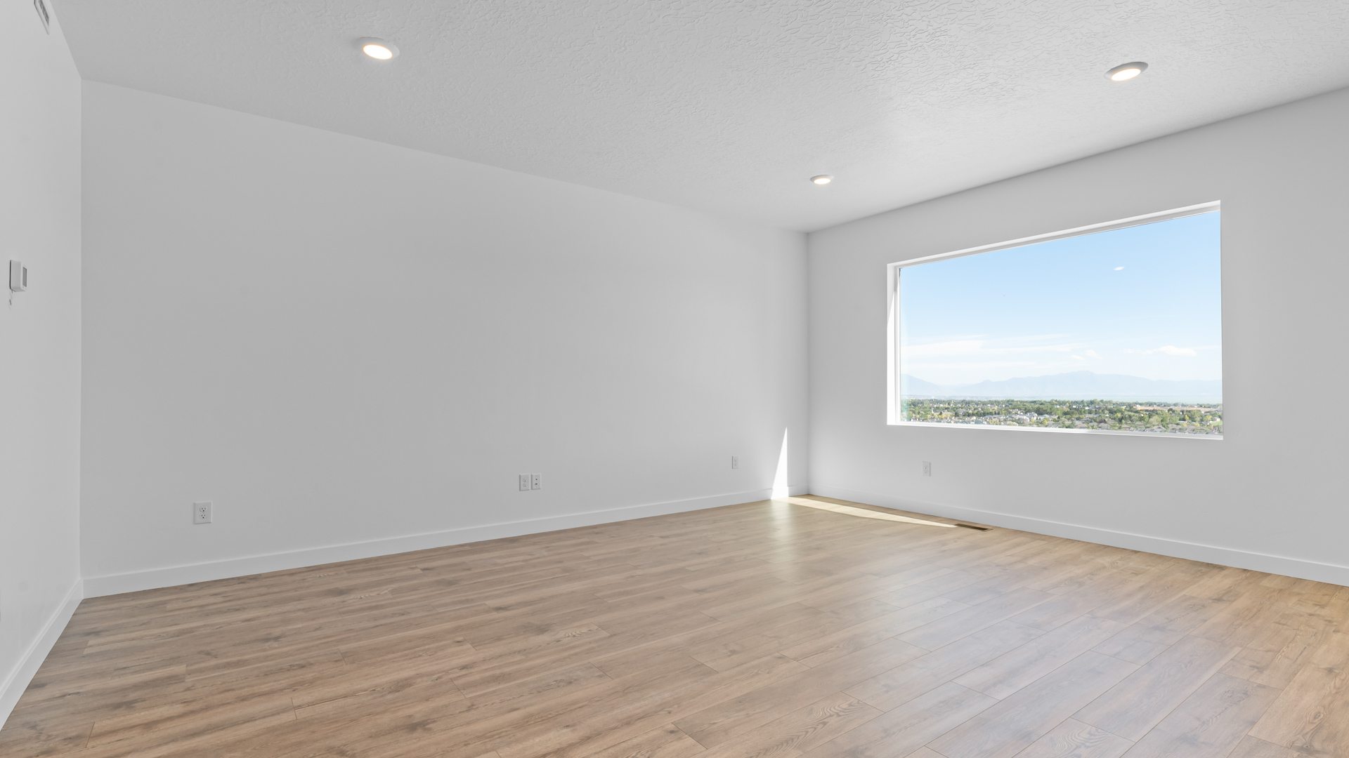 Family room with large window.