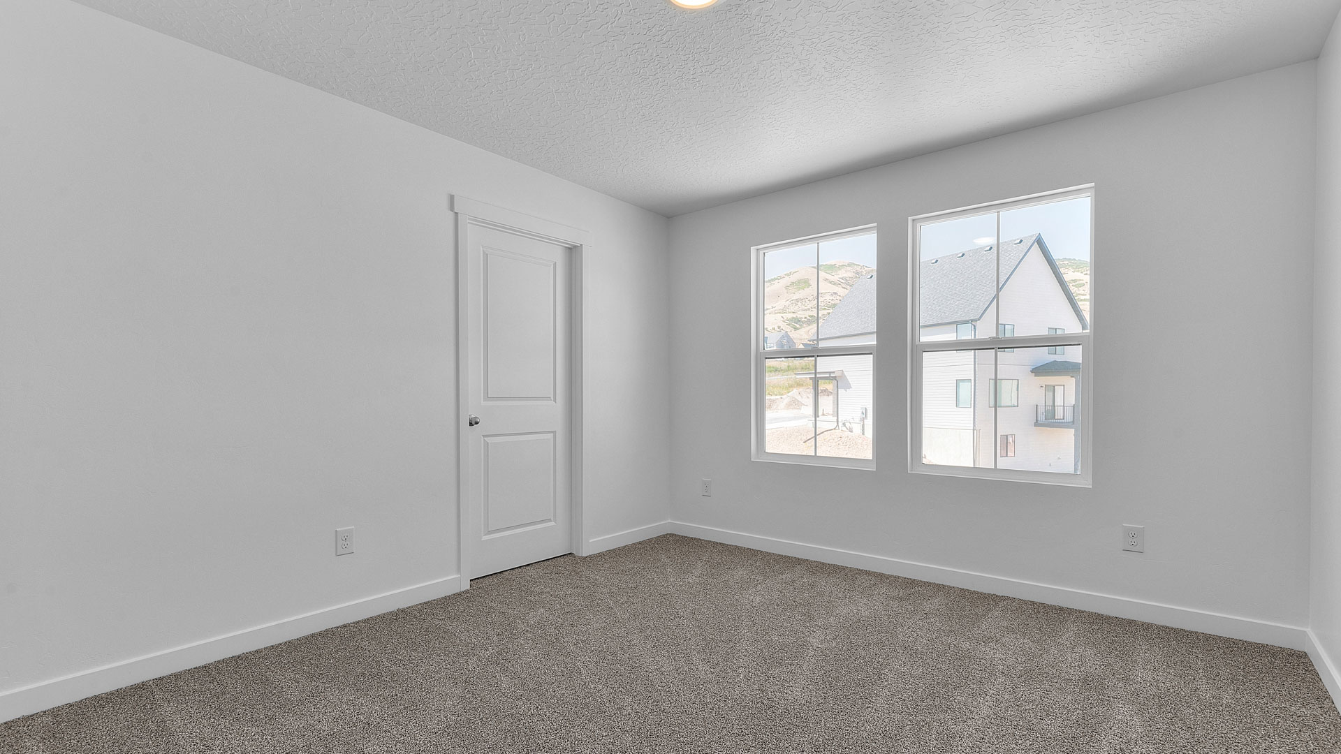 Bedroom with windows.