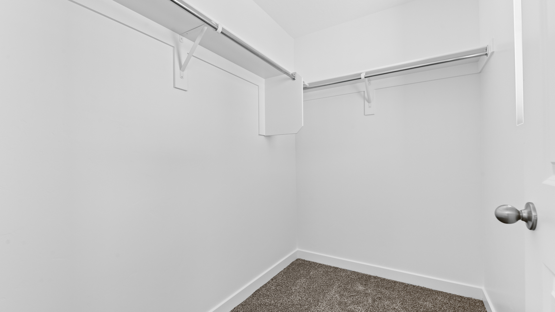 Walk-in closet with window.