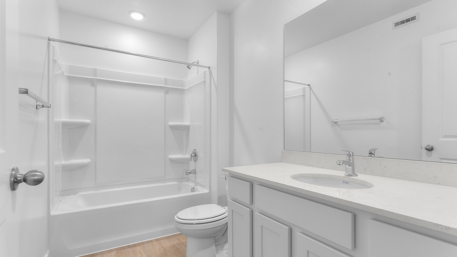 Bathroom with shower surround.