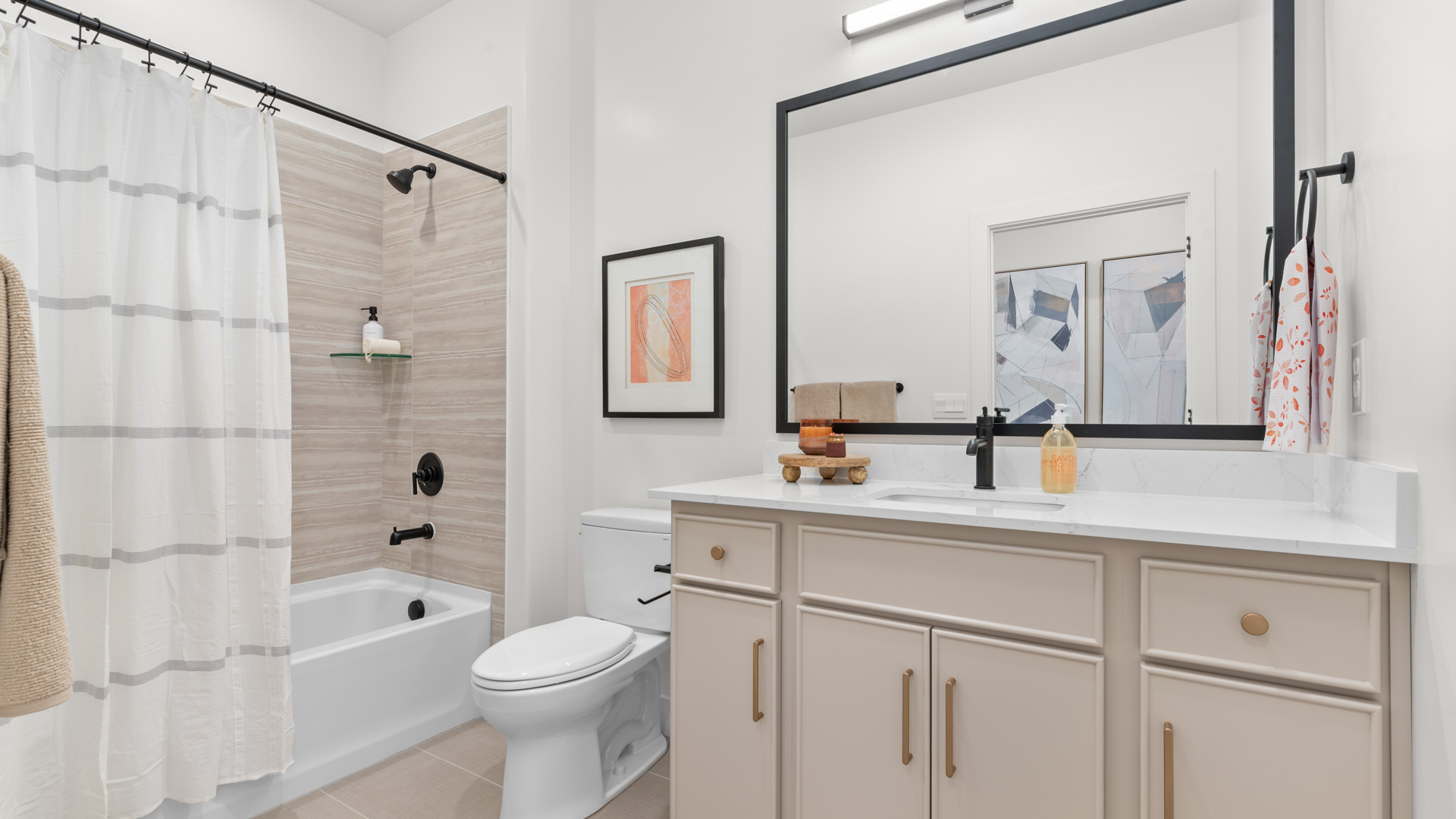 Bathroom featuring cabinets and countertops with bathroom surround.