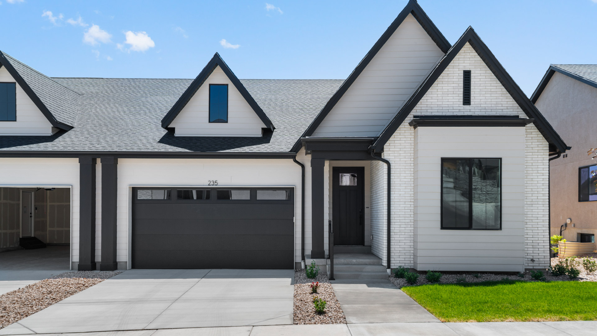 The Irvine twin home farmhouse elevation.