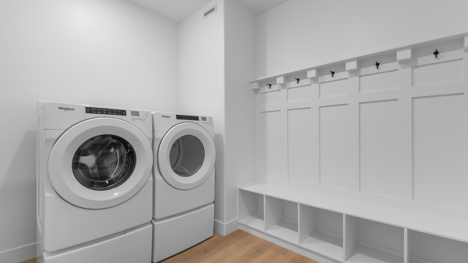 Laundry room with mudroom bench.