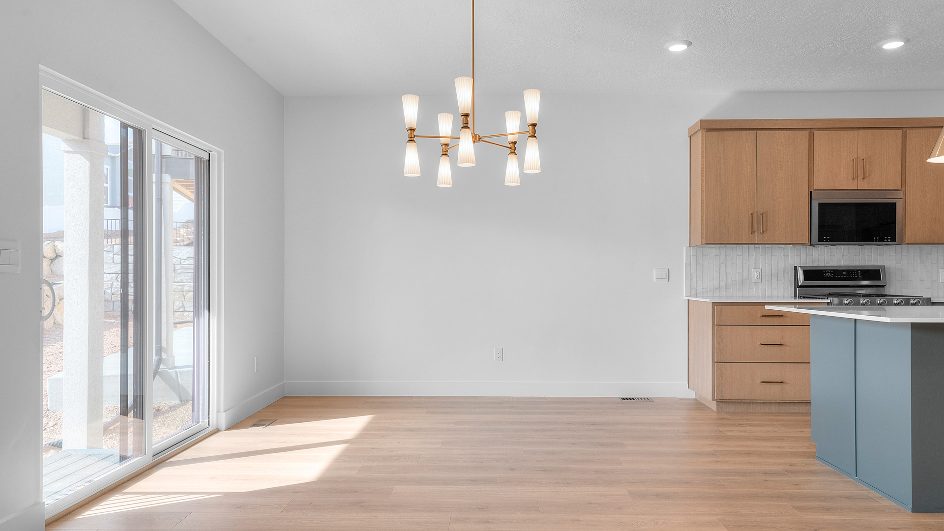 Large dining area with patio doors.