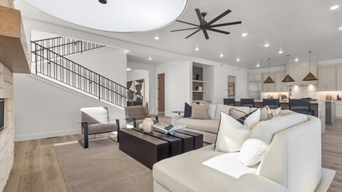 Family room with fireplace and windows.