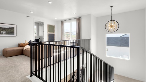 Upstairs loft space with windows.