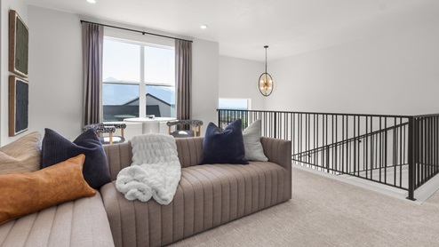 Upstairs loft space with windows.