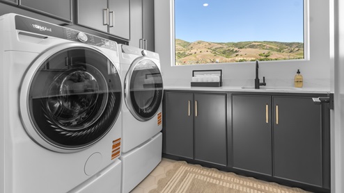 Laundry room with large window.