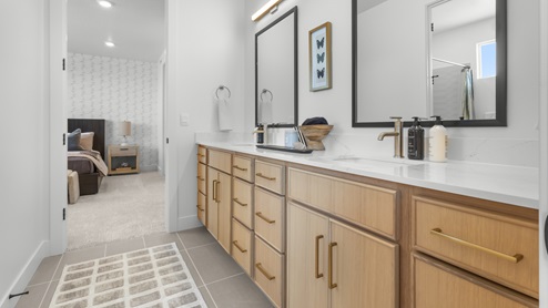 Spacious bathroom into bedrooms.