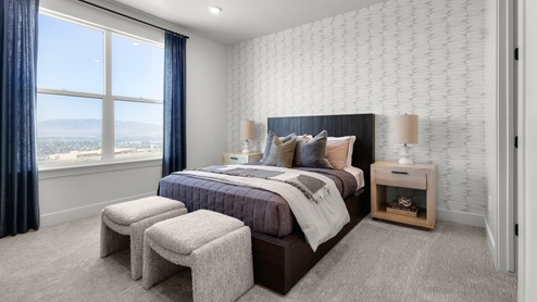 Bedroom with large window.