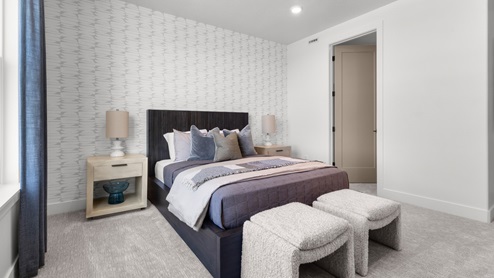 Bedroom with large window.