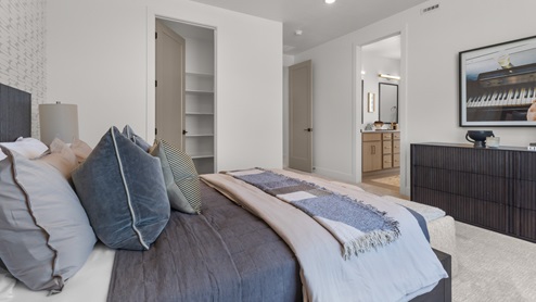 Bedroom with large window.