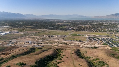 Aerial views of community looking towards Utah Lake.