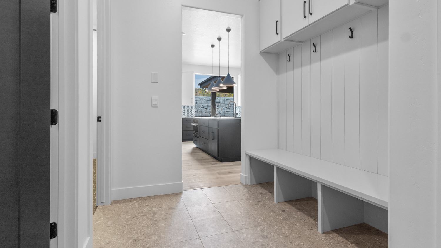 Mudroom with storage bench and seating.