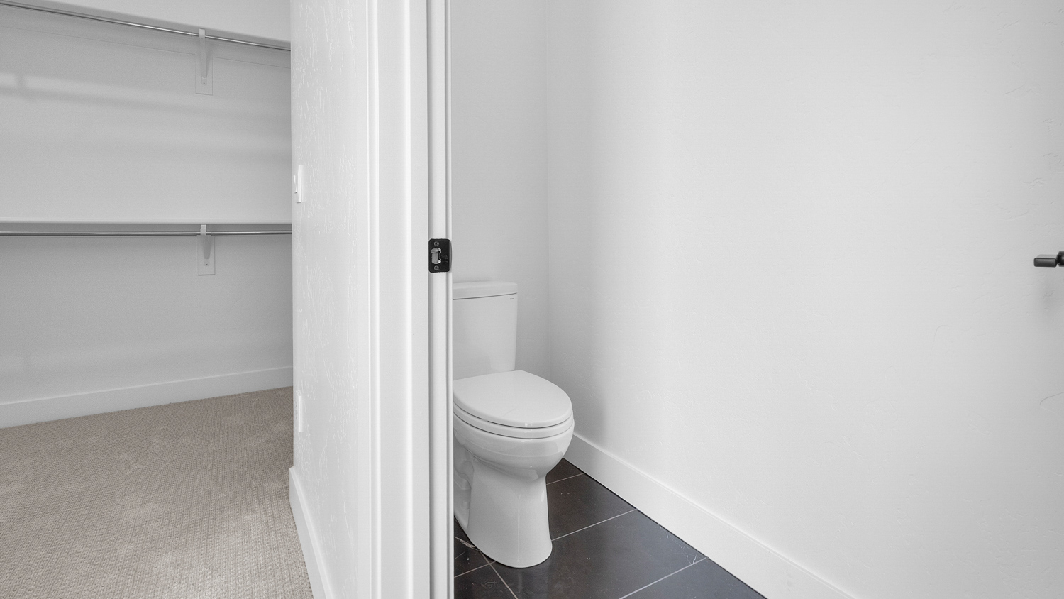 Water closet in primary bathroom.