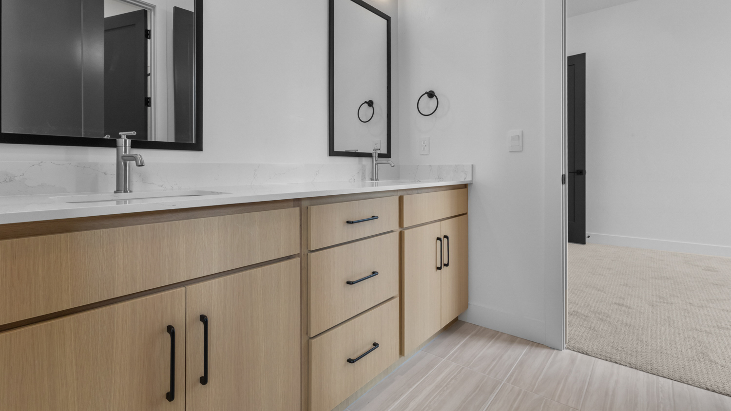 Double sink vanity in jack and jill bathroom.