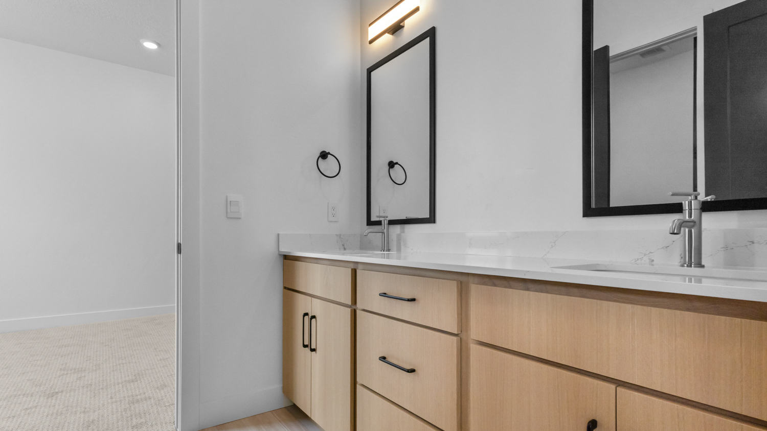 Double sink vanity in jack and jill bathroom.