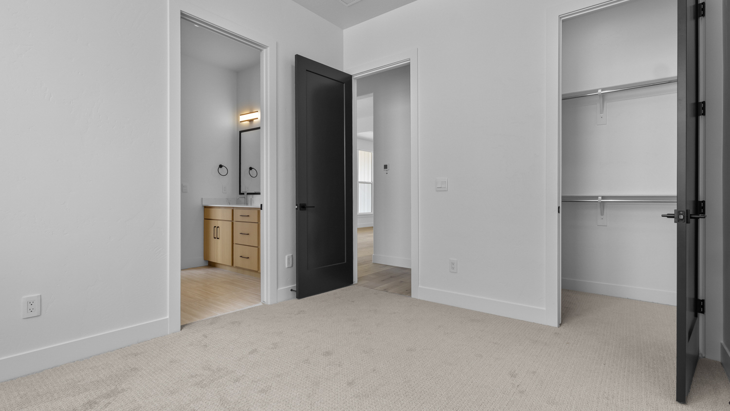 Bedroom with large window.