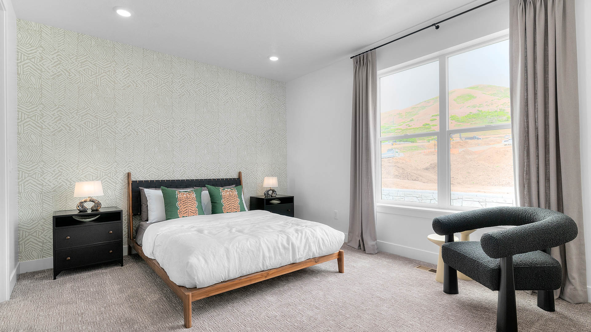 Bedroom with large window.