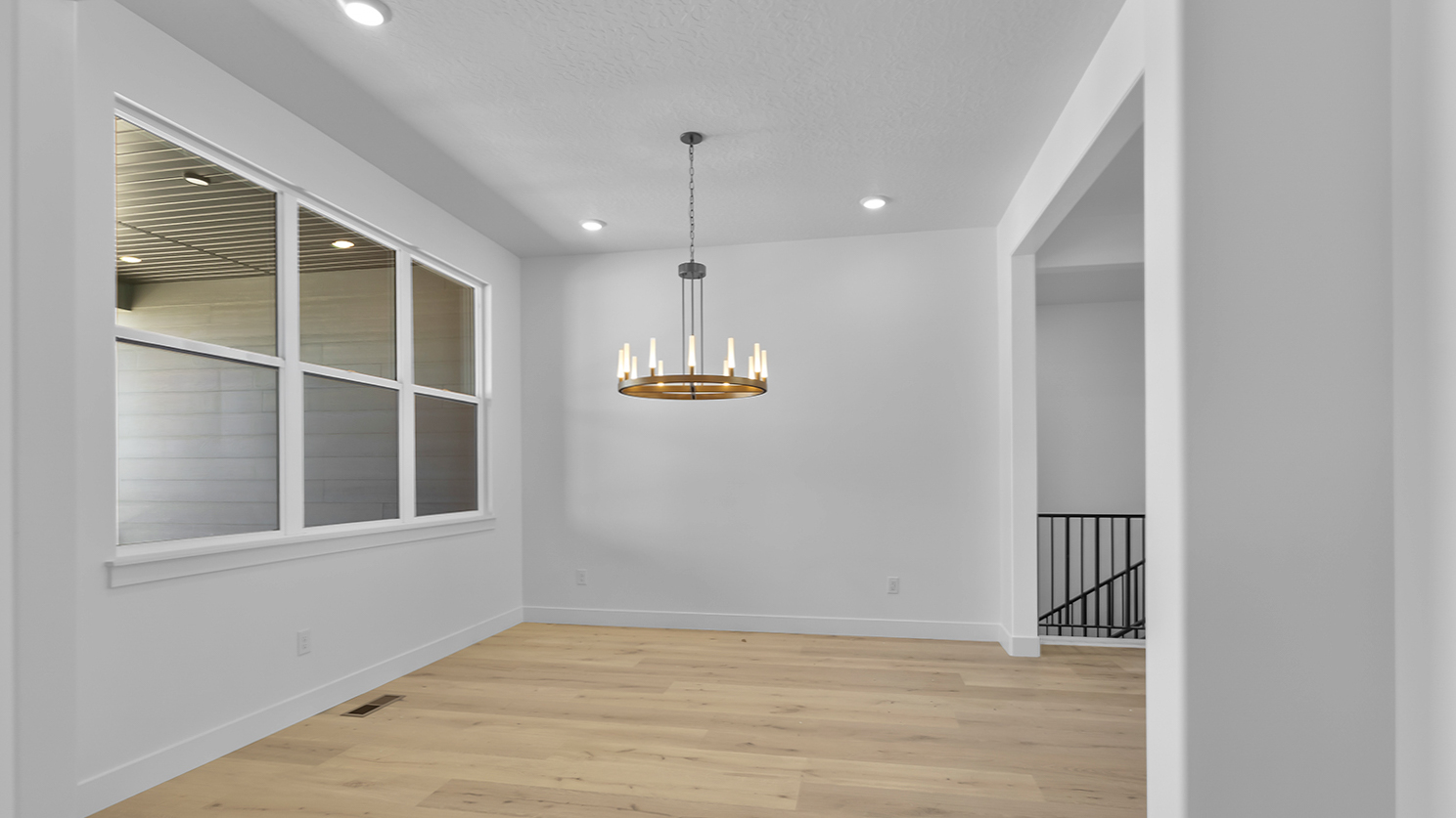 Dining room with large windows.