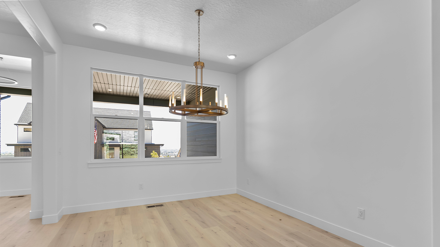 Dining room with large windows.
