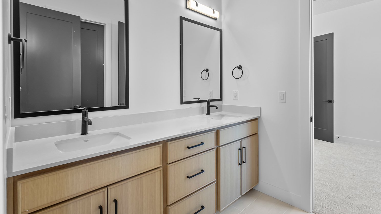 Double sink vanity in jack and jill bathroom.