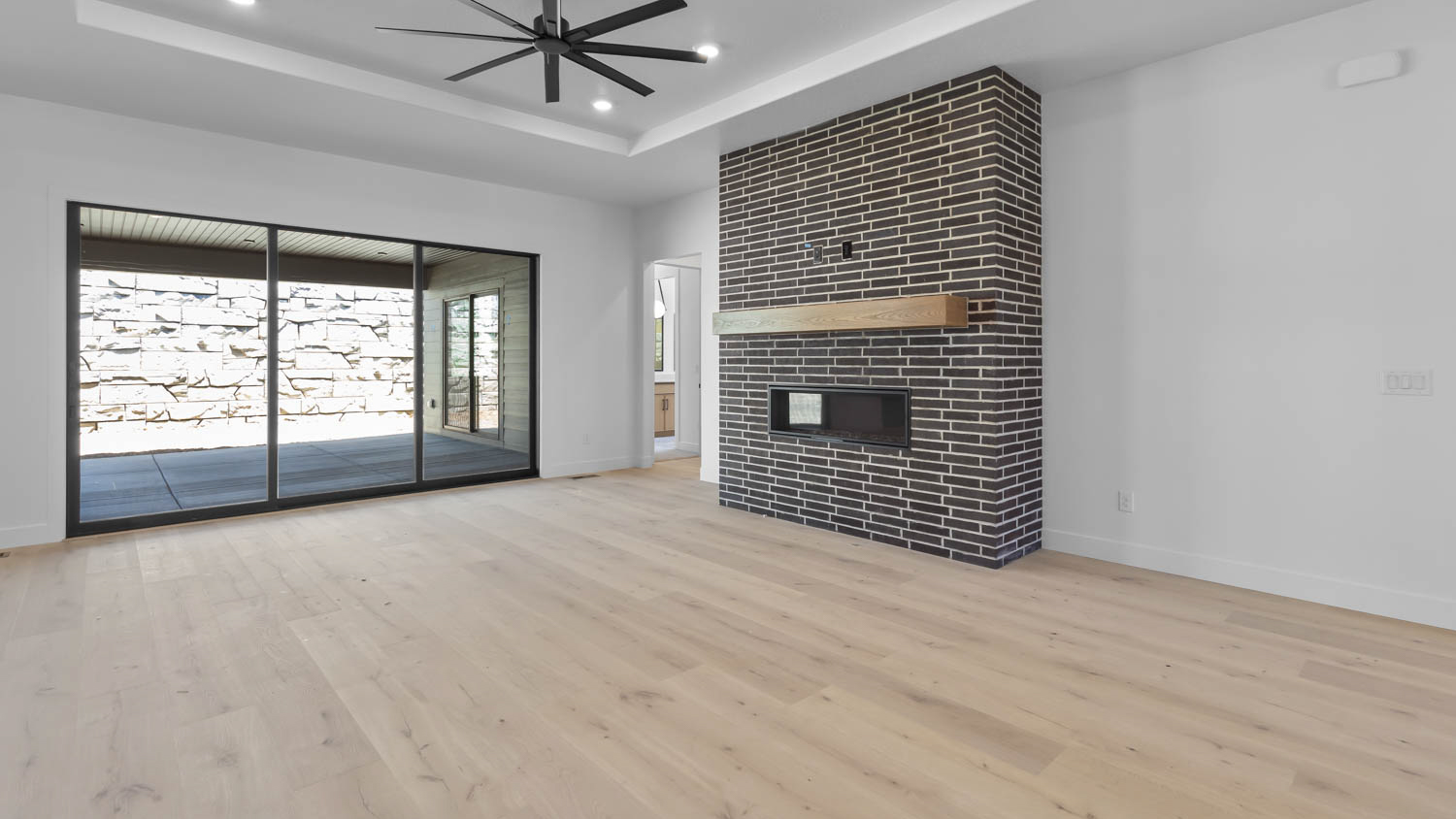 Family room with sliding glass patio doors.