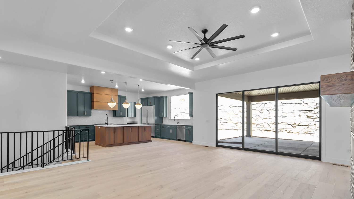 Family room with sliding glass patio doors.