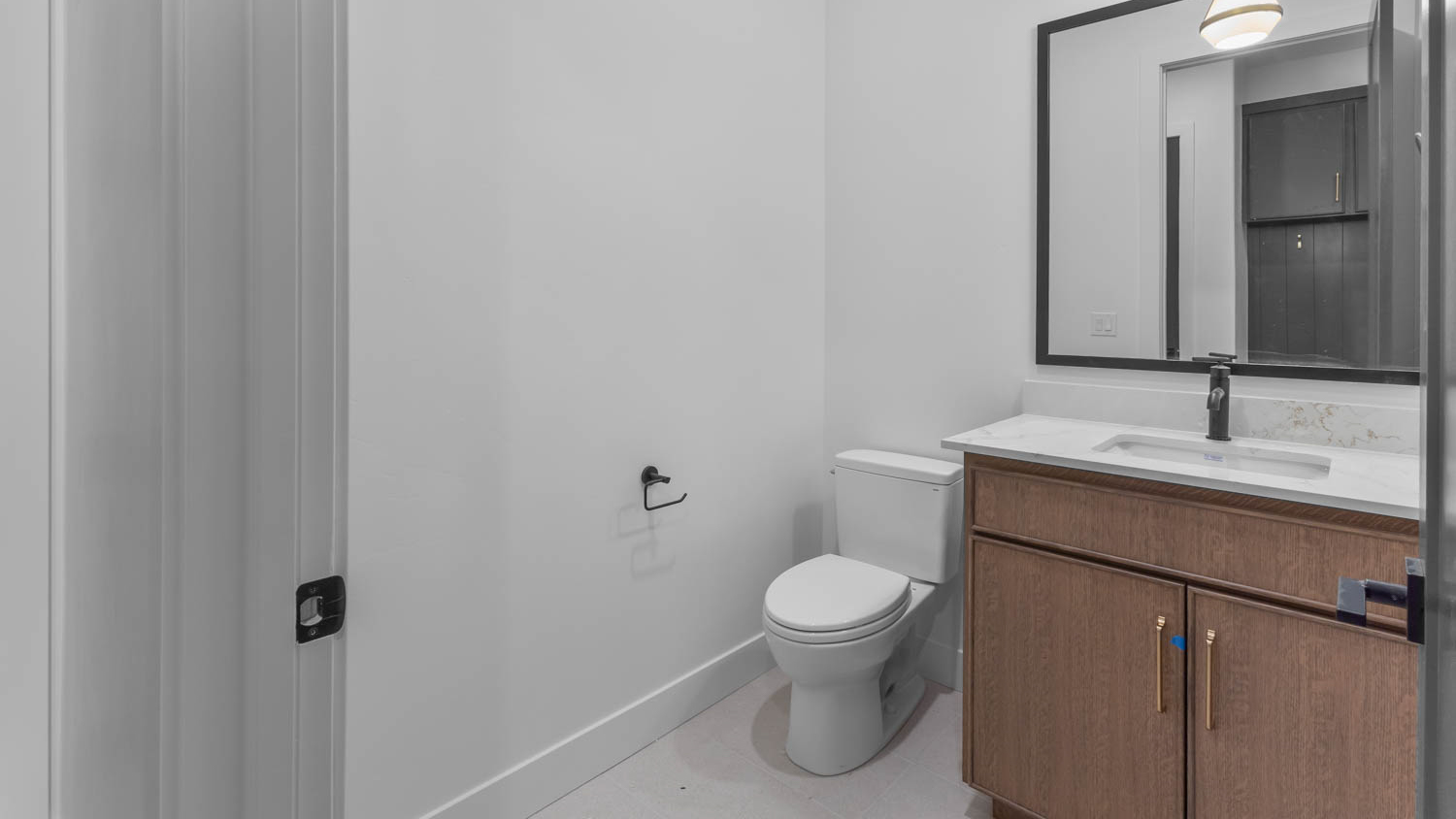 Powder bathroom with vanity.