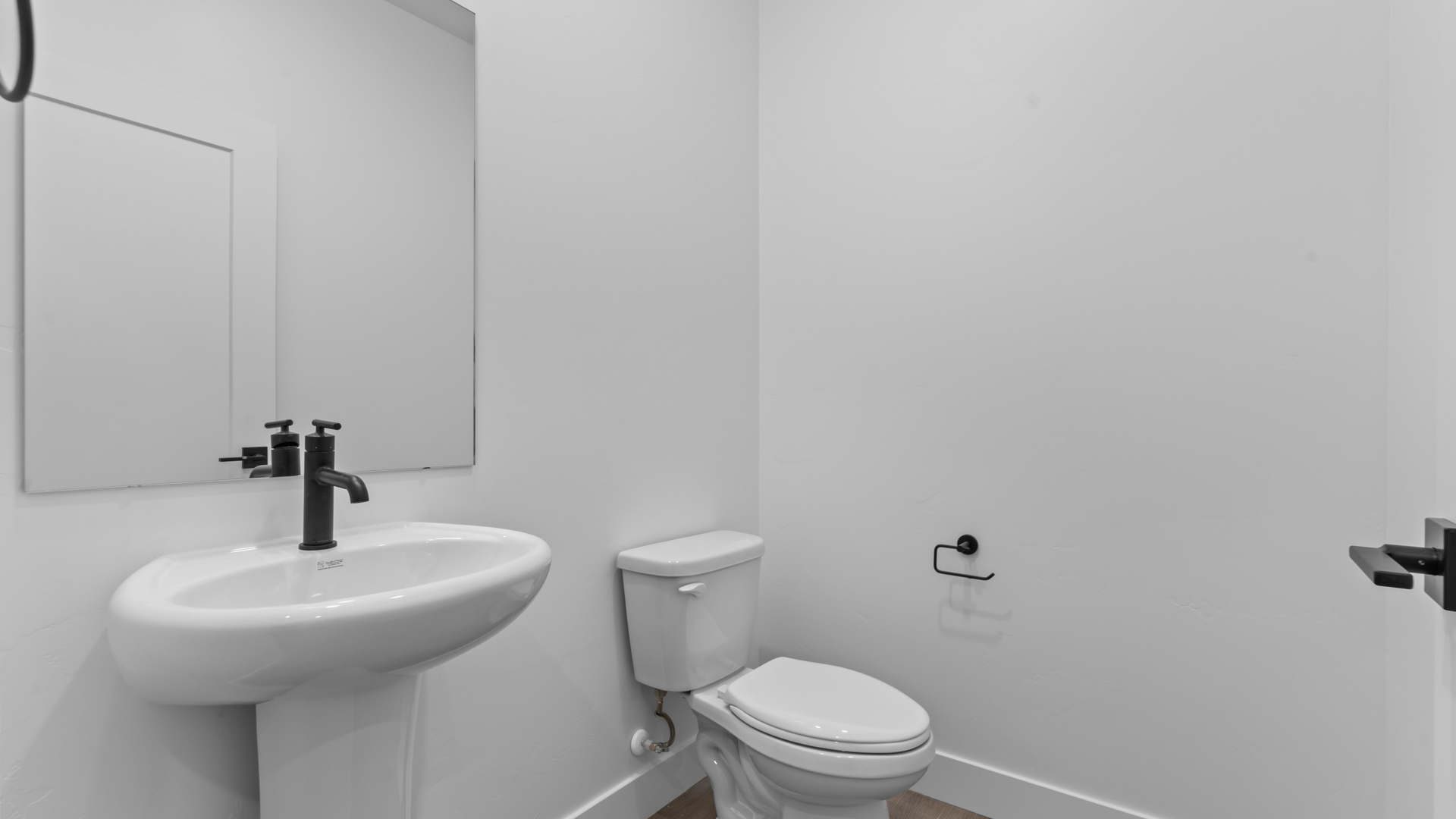 Powder bathroom off of mudroom.