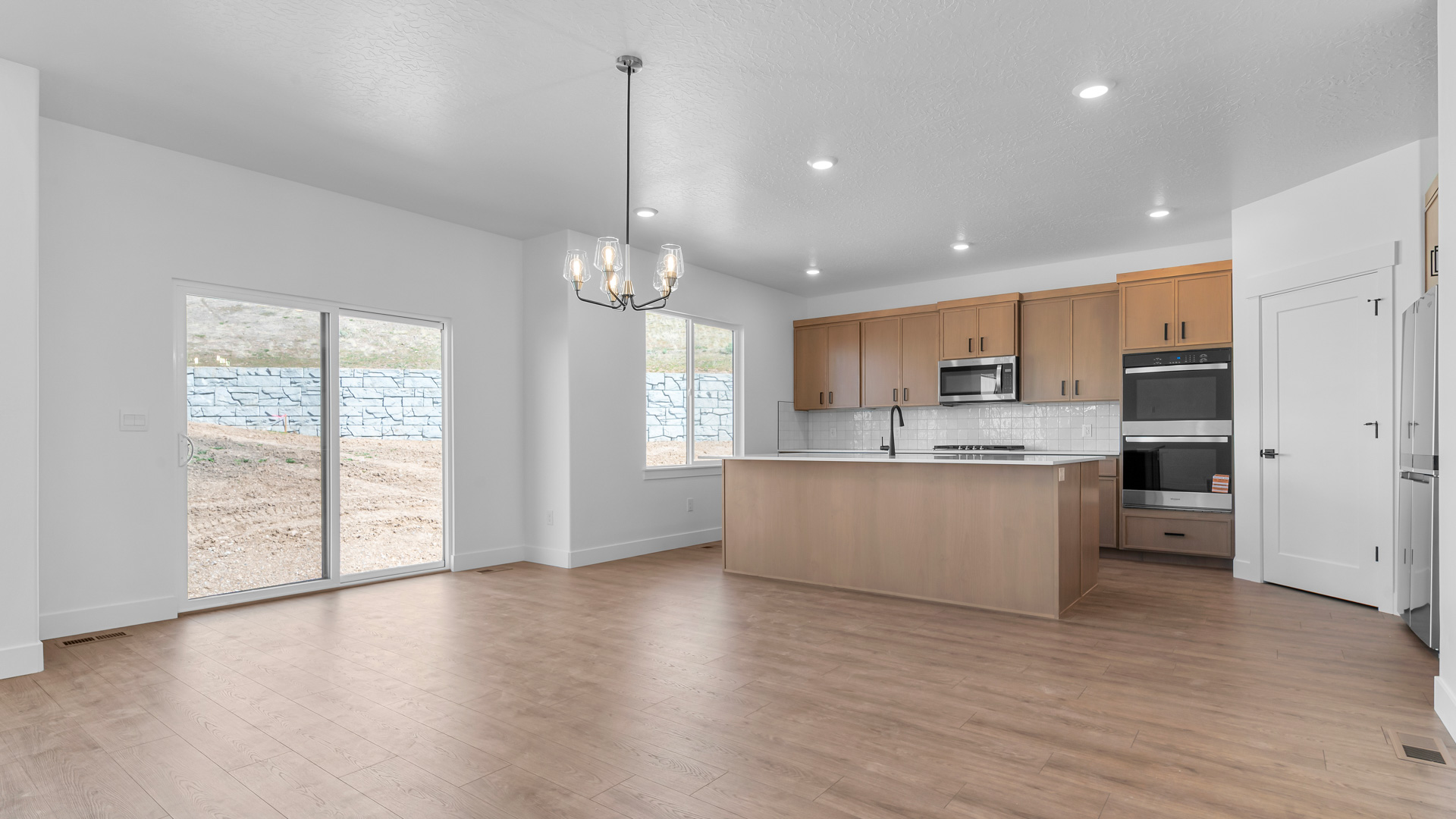 Kitchen with kitchen island and sink.