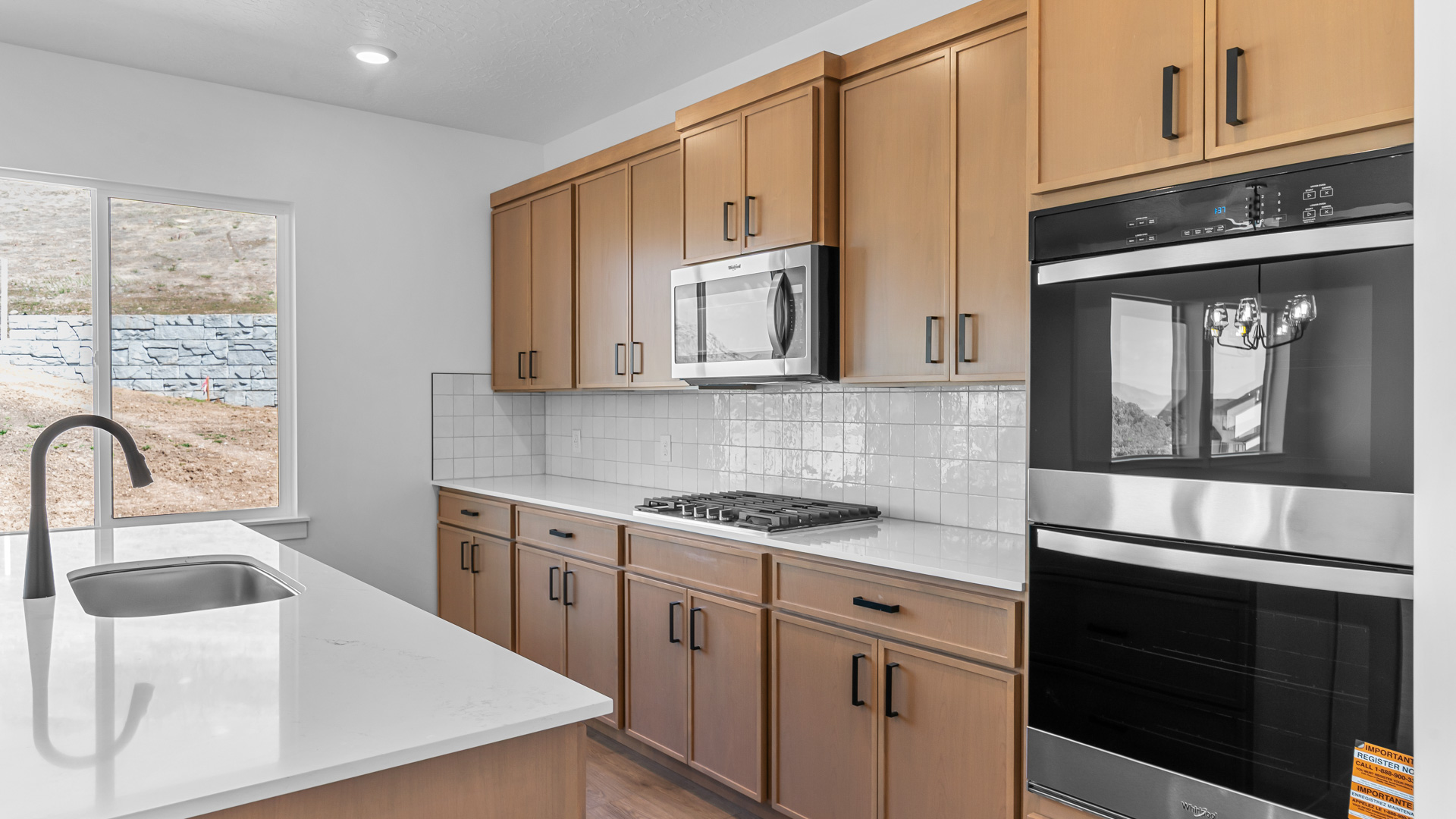 Kitchen with kitchen island and sink.
