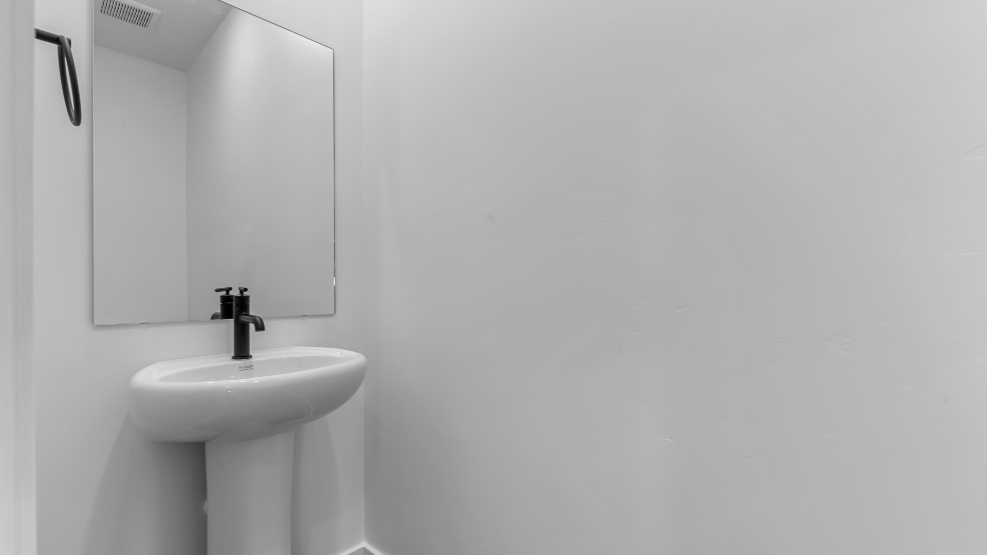 Powder bath with pedestal sink.