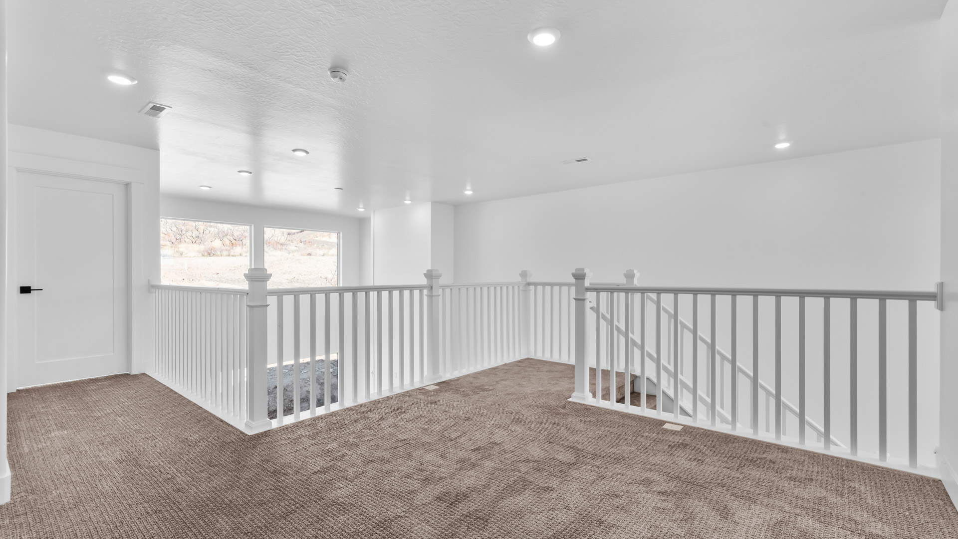 Upstairs loft space open to below.