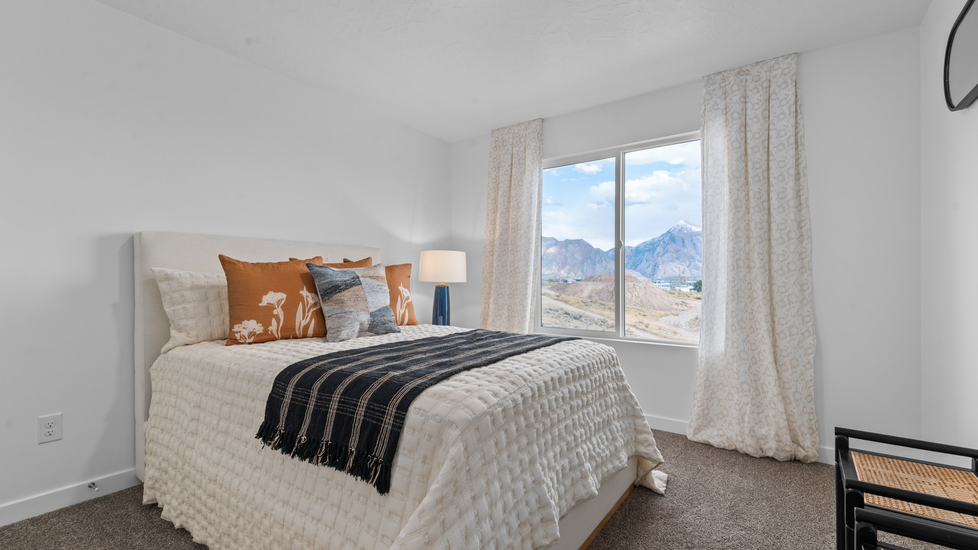 Bedroom with large window.