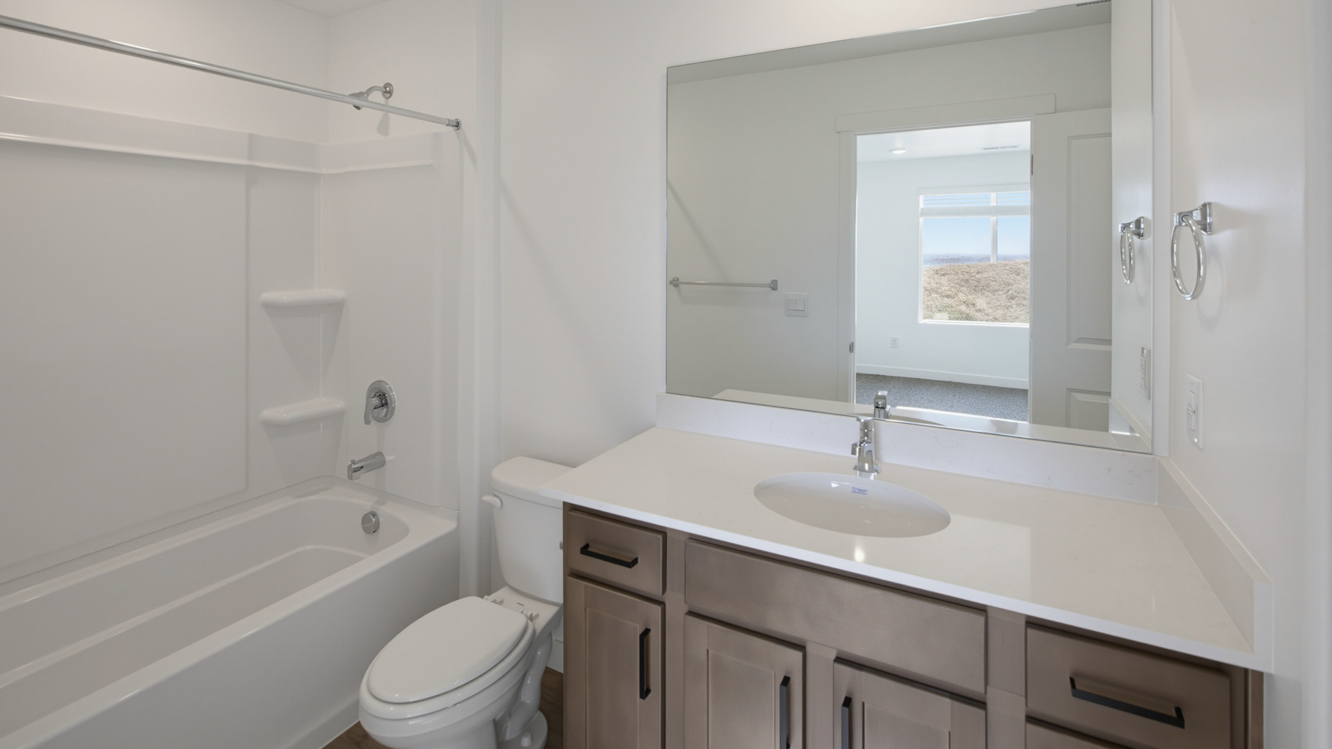 Bathrooms with vanity and shower surround