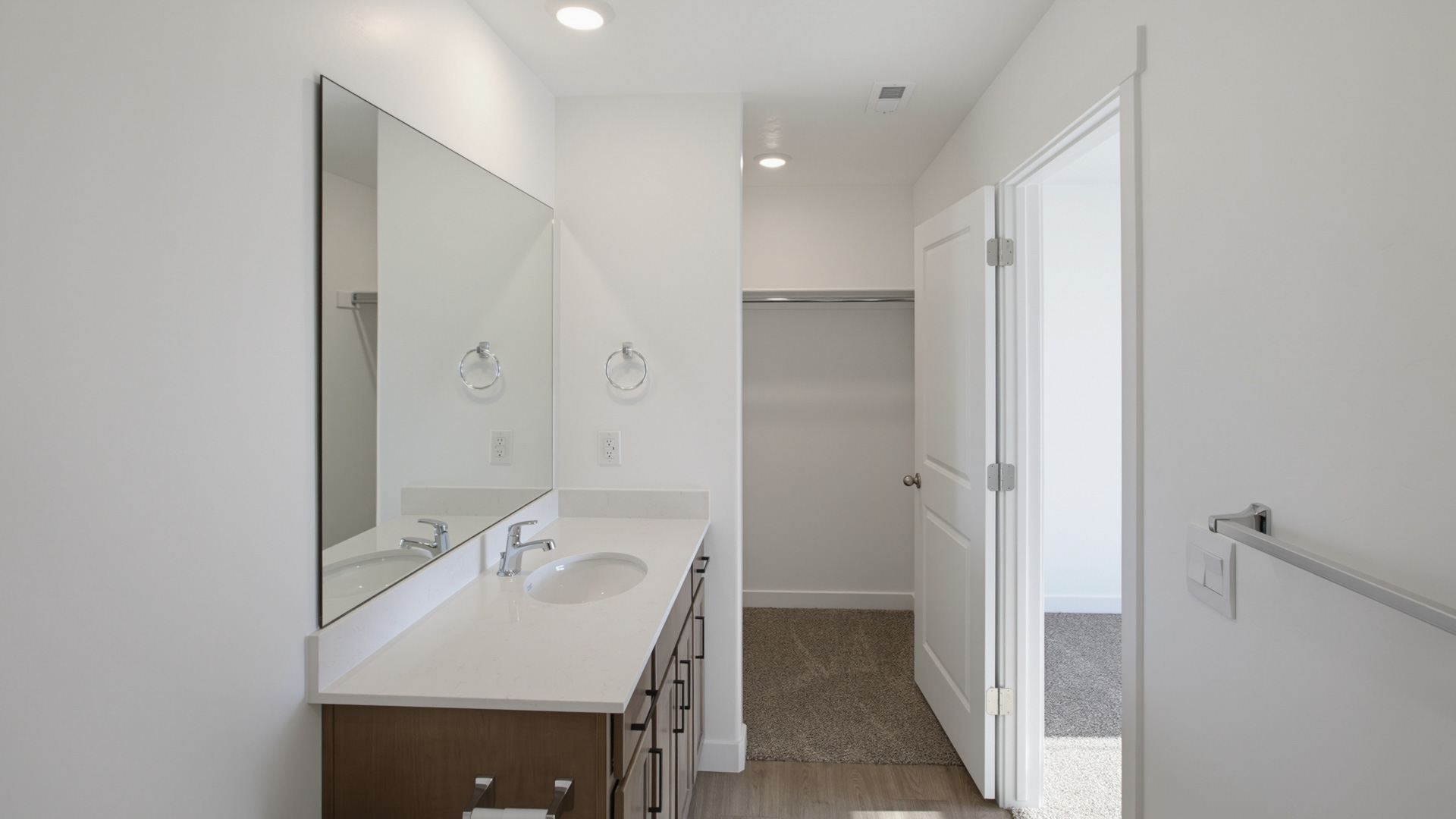 Bathrooms with vanity and shower surround