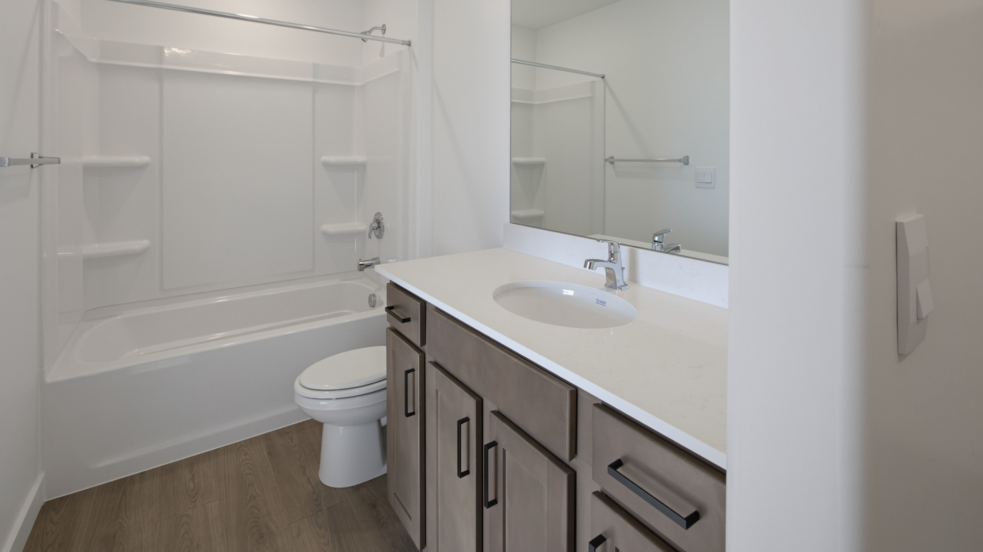 Bathrooms with vanity and shower surround