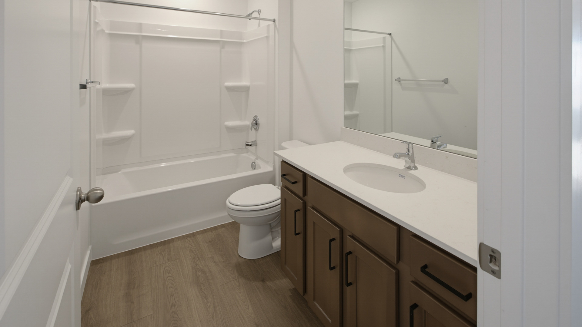 Bathrooms with vanity and shower surround
