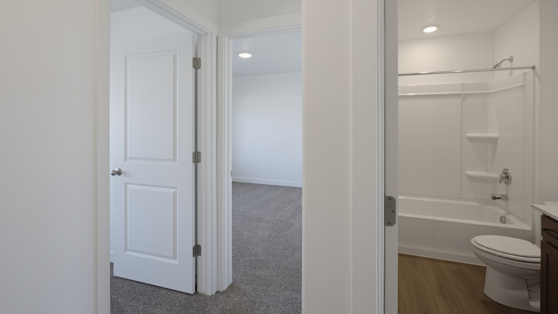 Bathrooms with vanity and shower surround
